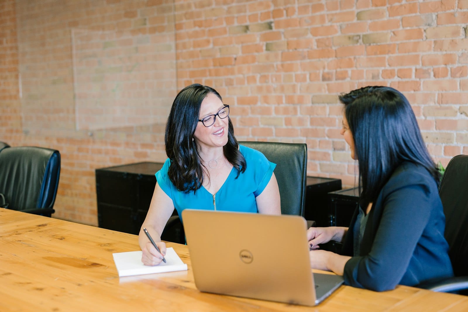 Employees submitting an approval process via a digital device